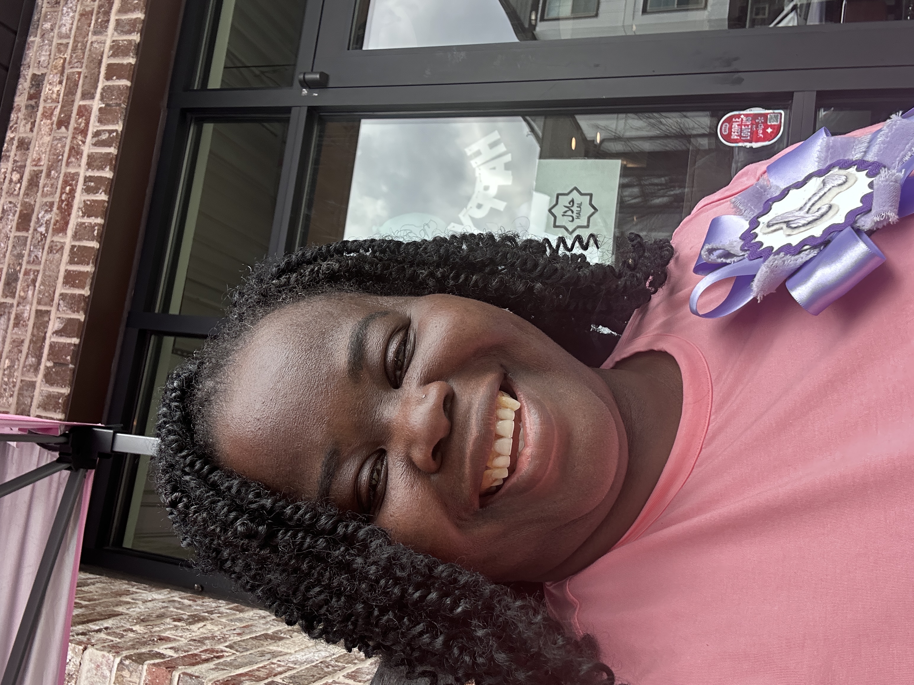 Tee Coffee Studio owner smiling at Atlanta birthday pop-up community celebration event