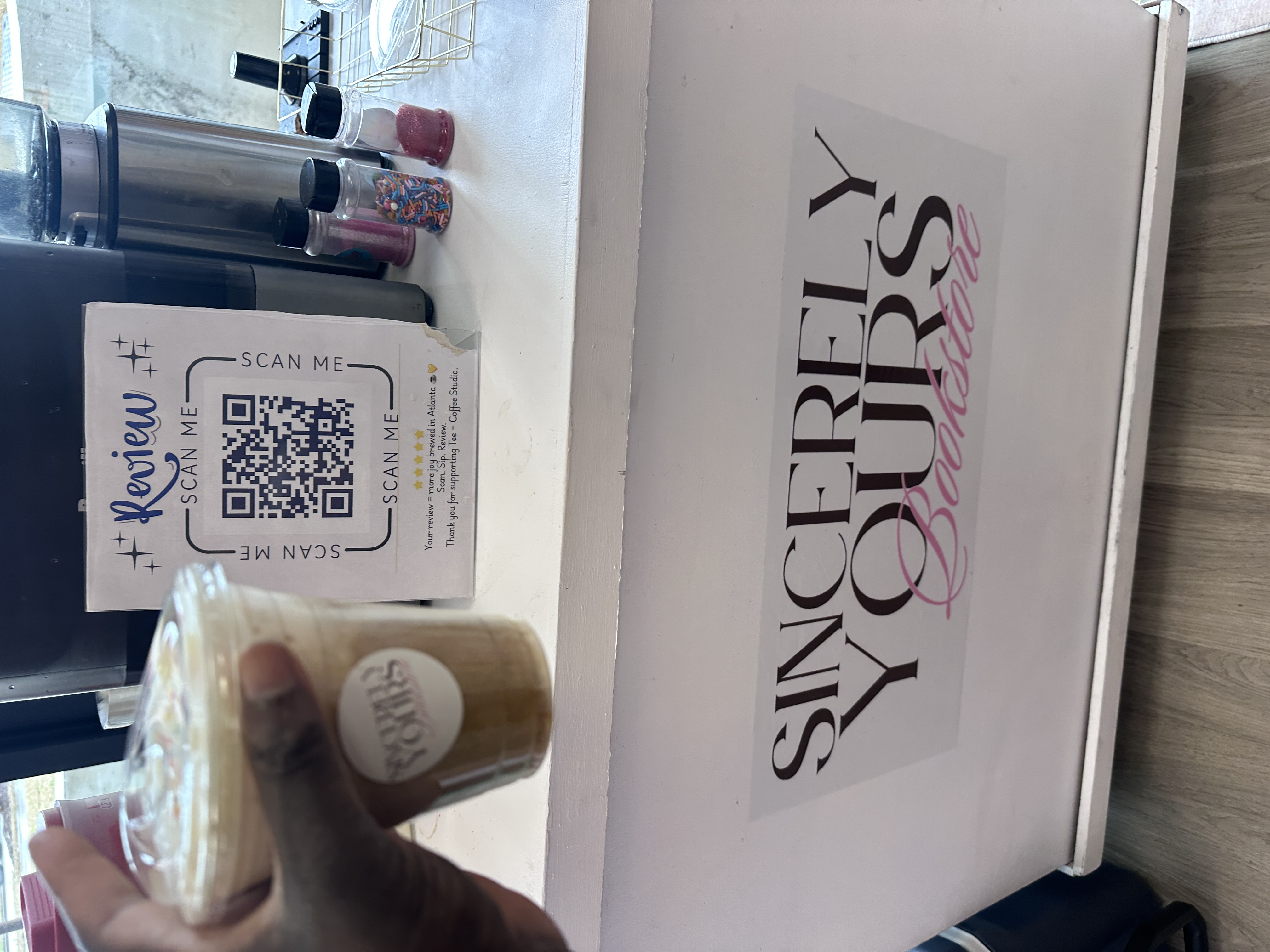 Tee Coffee Studio espresso cart with Google review QR code at Sincerely Yours Bookstore Atlanta