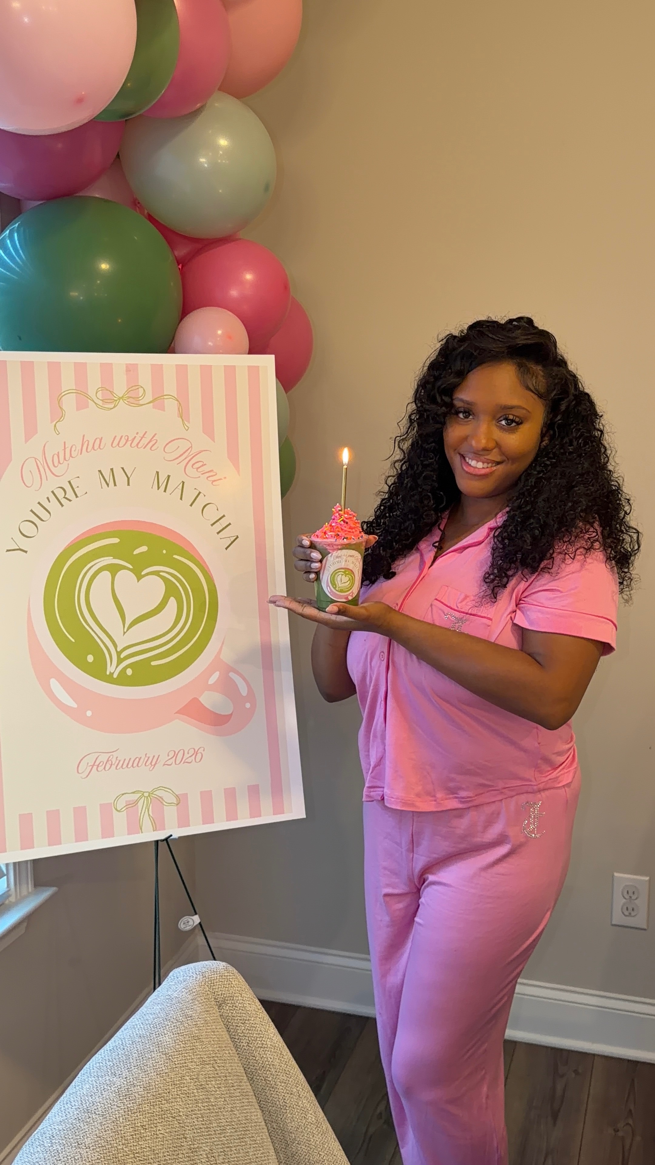 Birthday matcha drink with lit candle and sprinkles at Atlanta matcha studio experience